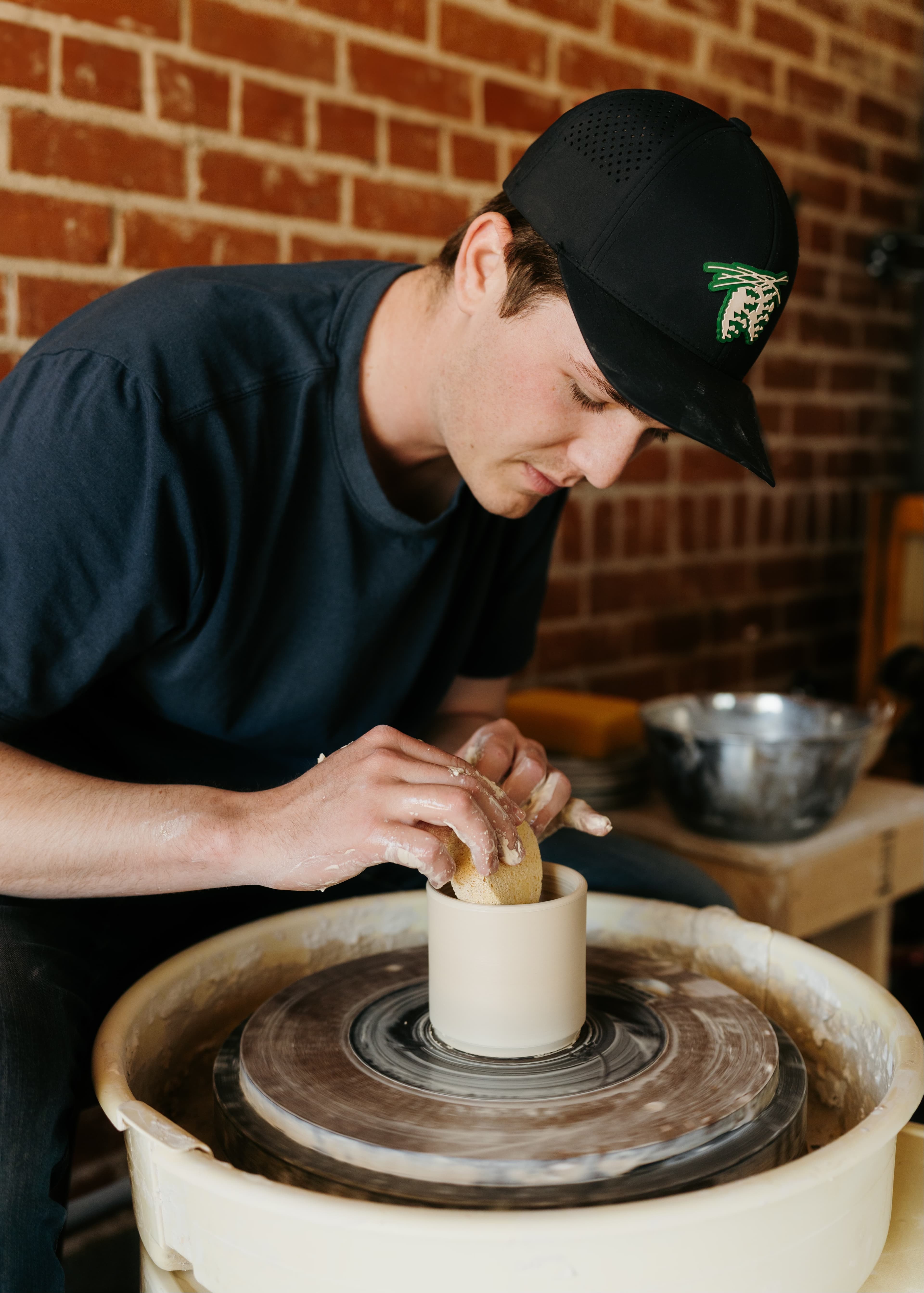 Nathan Coons at work in the studio, clay, Phoenix, Arizona